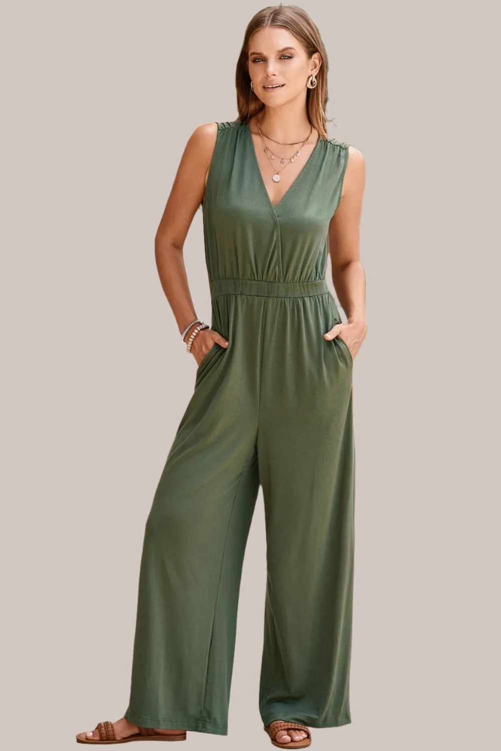 Green Jumpsuit with Plunging Neck and Spaghetti Sleeve Wide Leg Pants